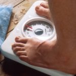 feet on weighing scale